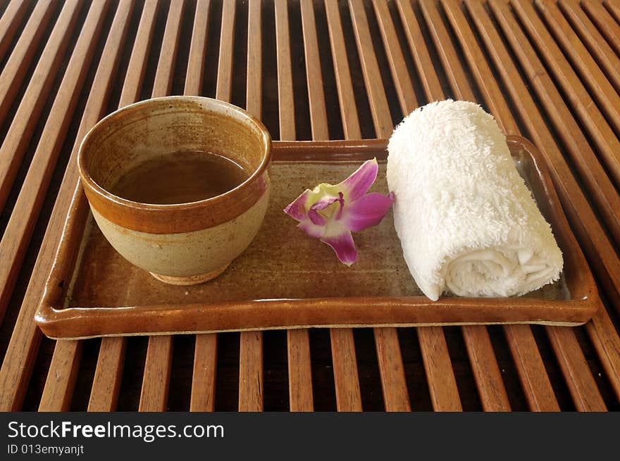 Cup of oriental tea served before massage