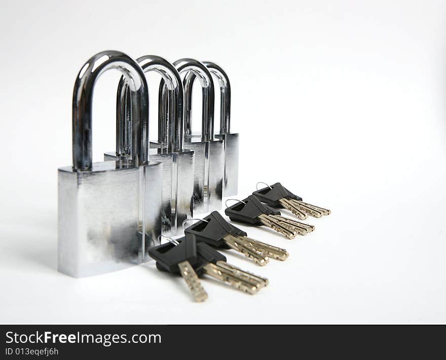 Locks and keys on white background.