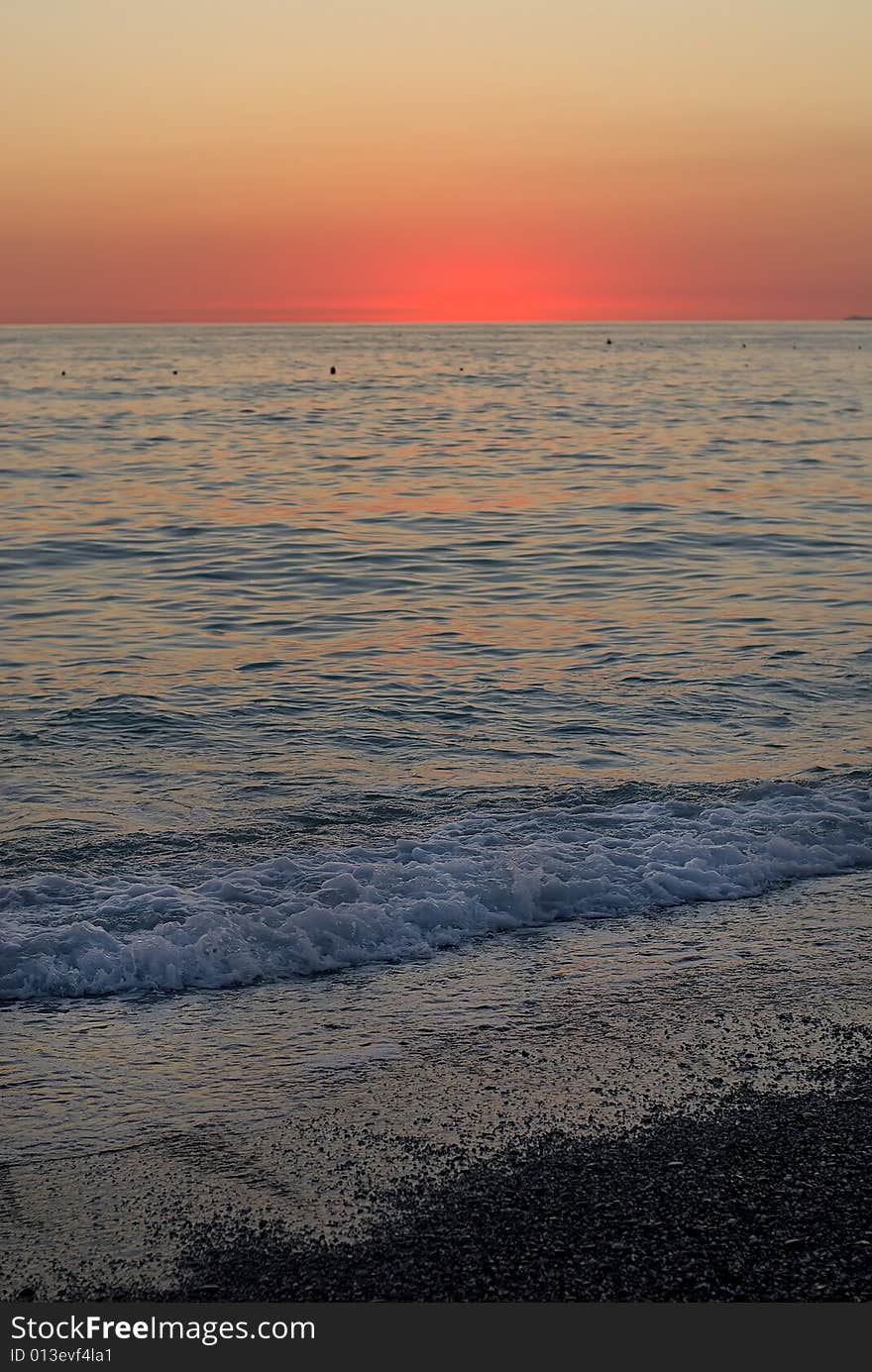 A sea in a blue at the sunset. A sea in a blue at the sunset