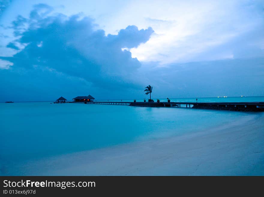 View of sunset on a tropical beach in Maldives