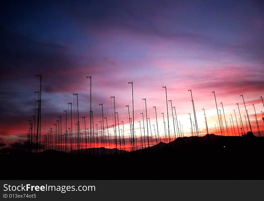 A few of silhouette bird cage with sunset background