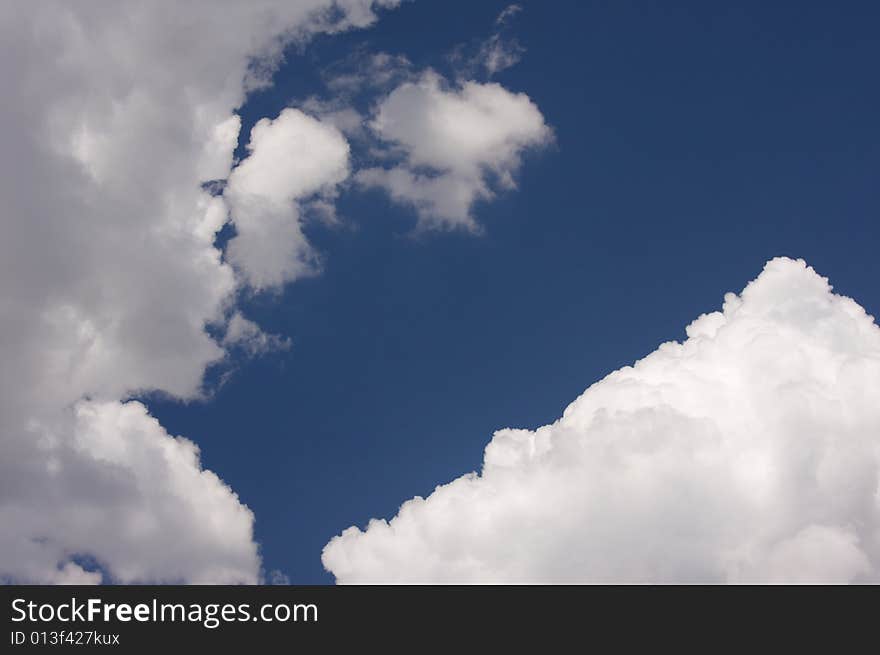 Puffy Clouds on a blue sky.