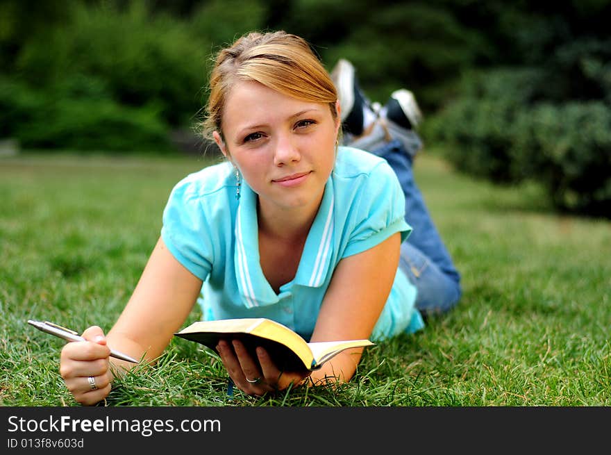 Sisters Reading in a public park. Sisters Reading in a public park