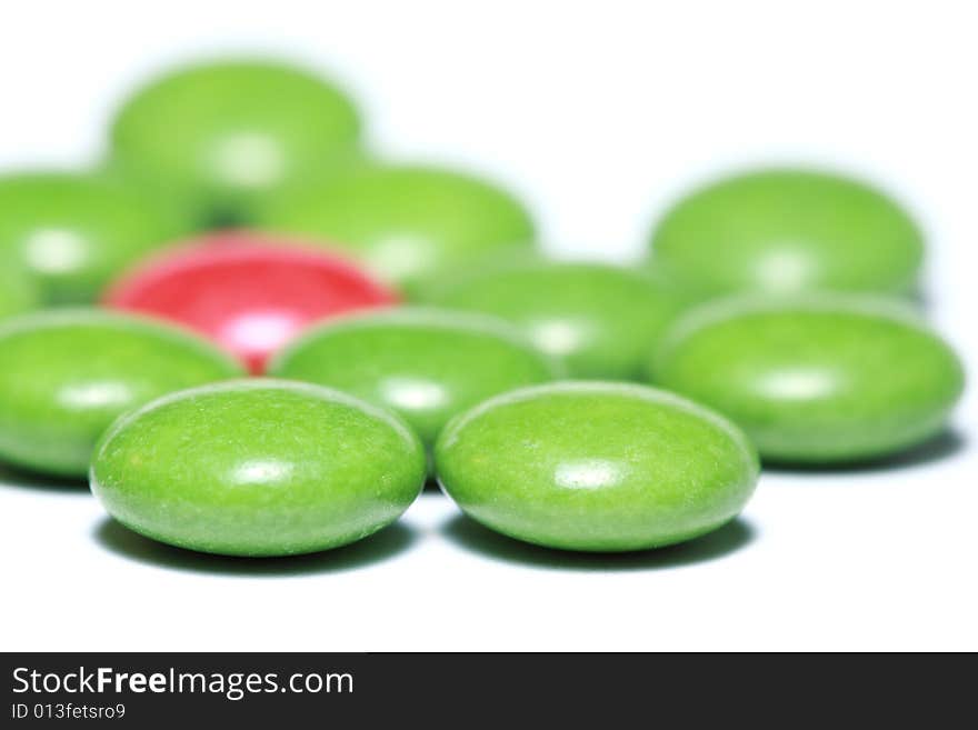 Colorful candies close-up isolated on white