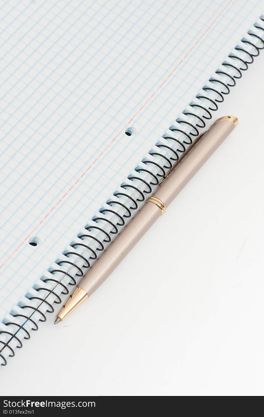 Notebook with pen on white background. Notebook with pen on white background