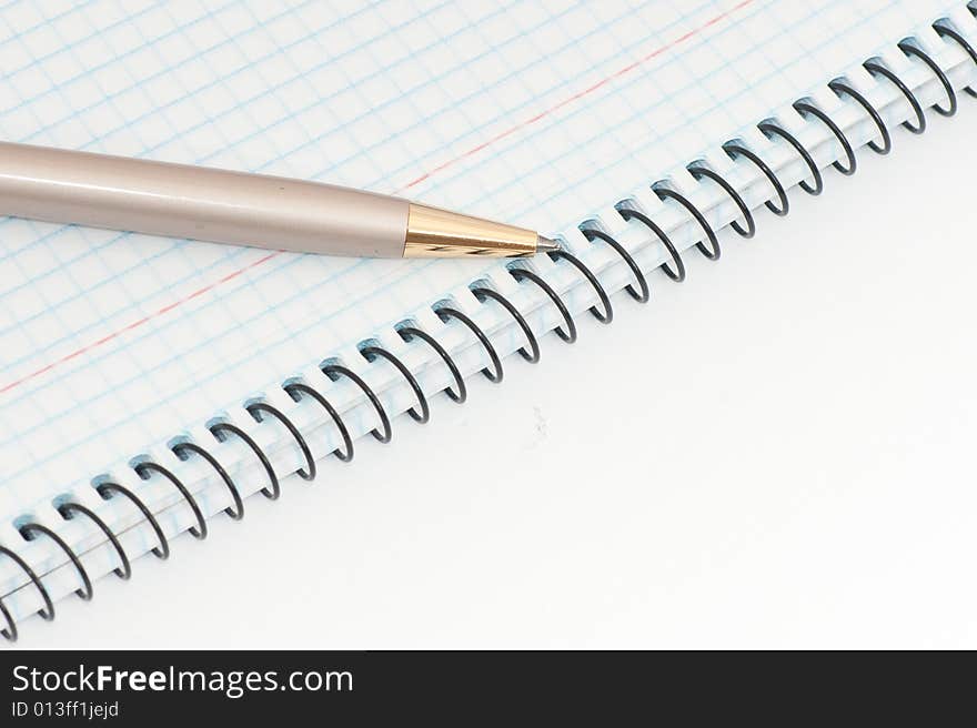 Notebook with pen on white background. Notebook with pen on white background