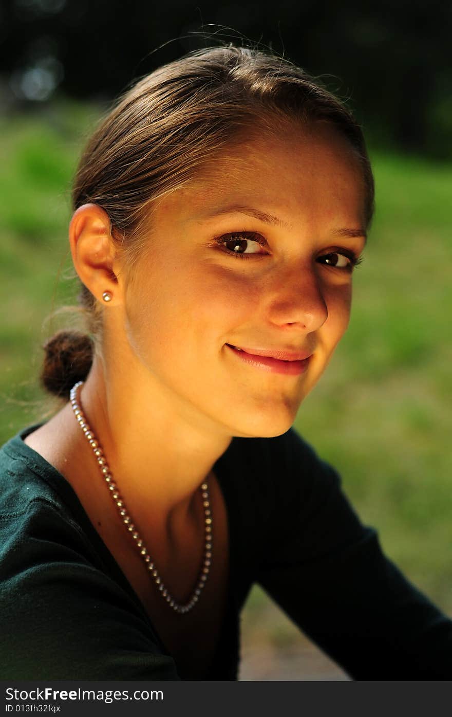 Beautiful girl in a public park