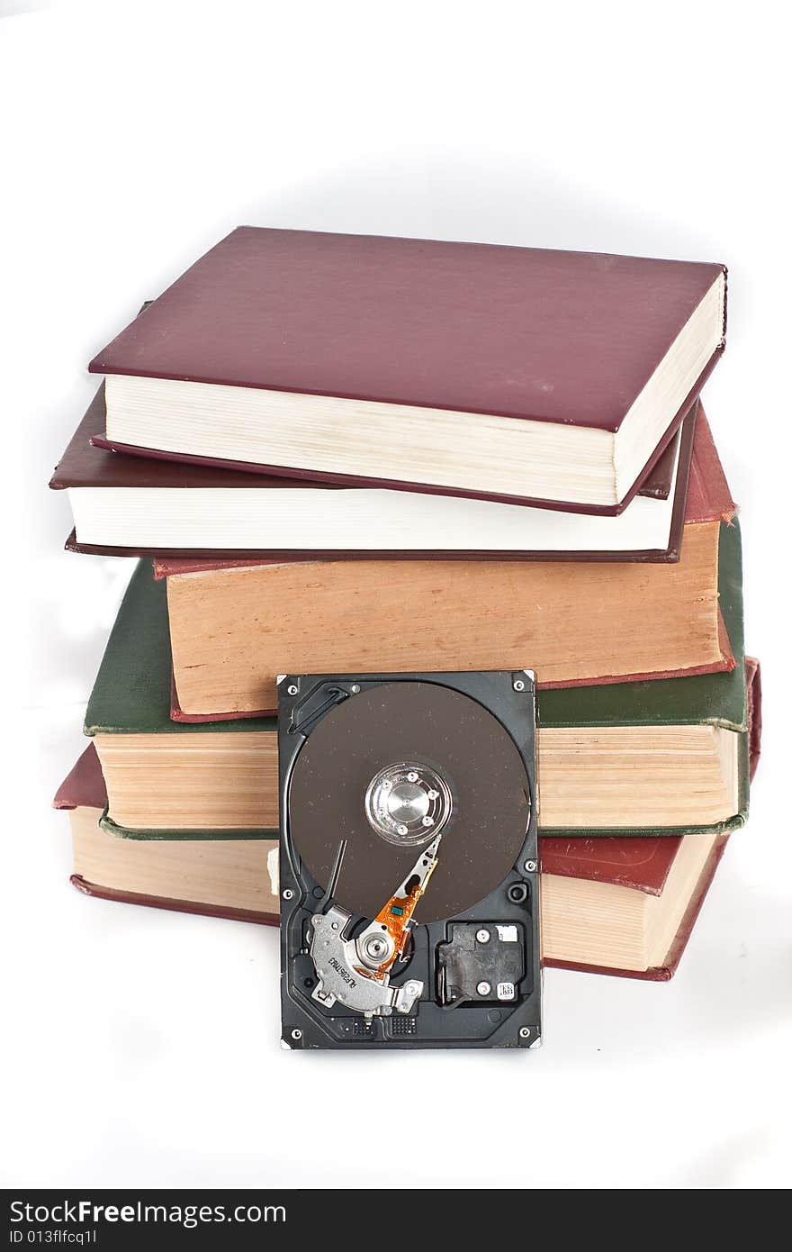 Hard disk and old books. Hard disk and old books