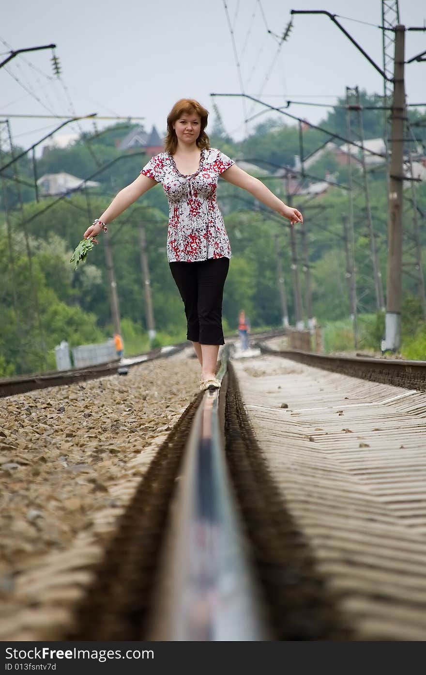 The Girl Walks On Rails