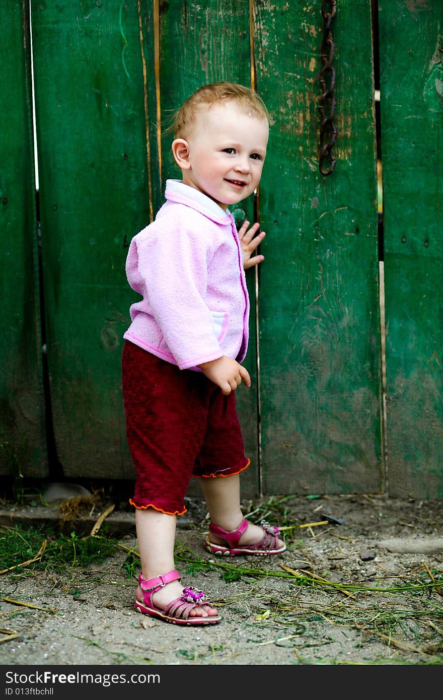 Baby-girl Near Fence