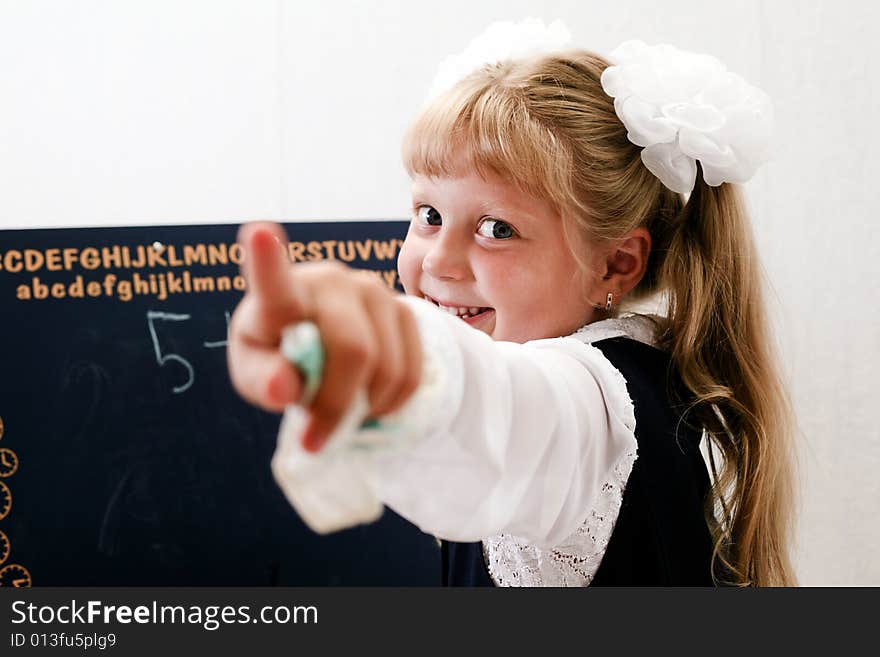 Little Girl Near Chalkboard