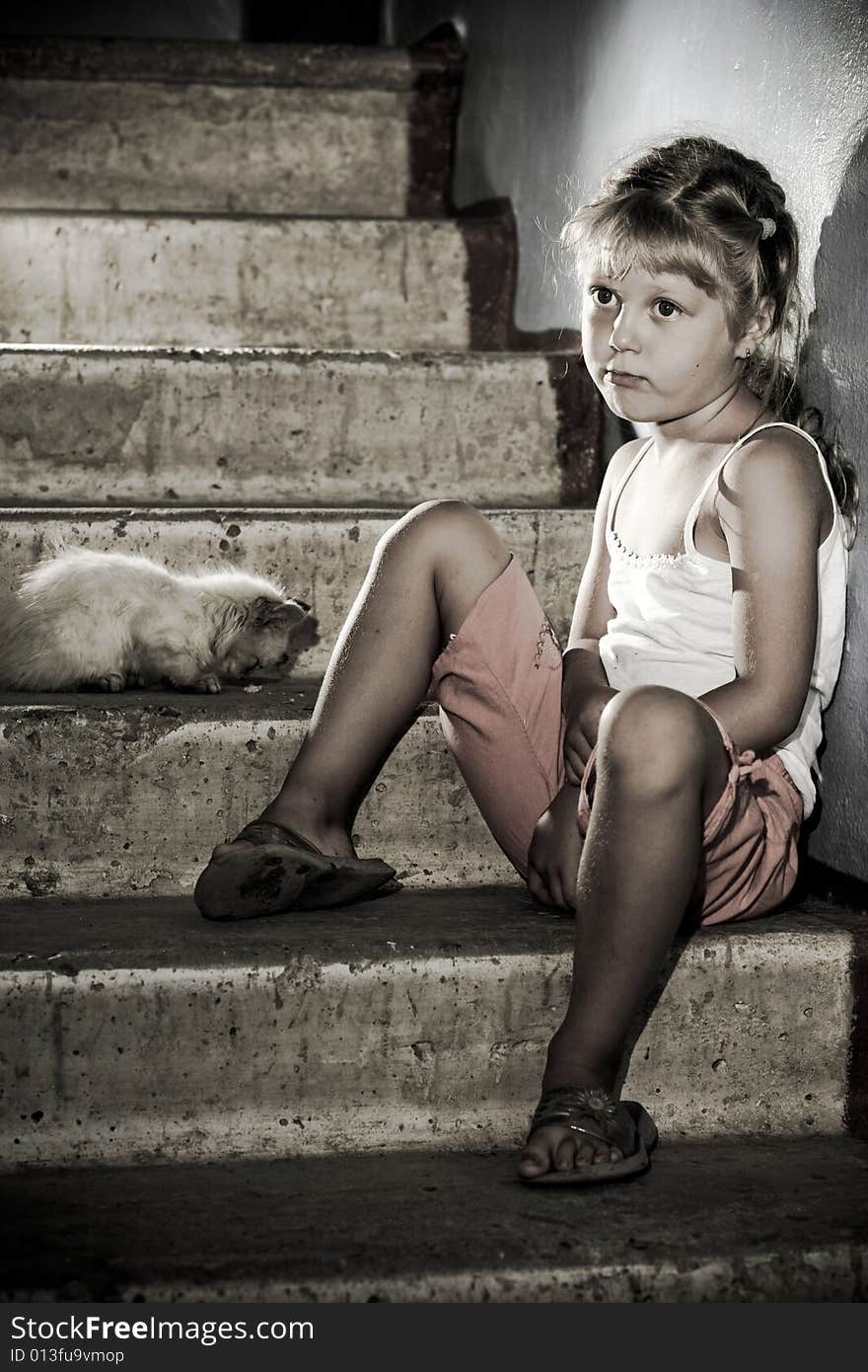 Sitting girl with cat