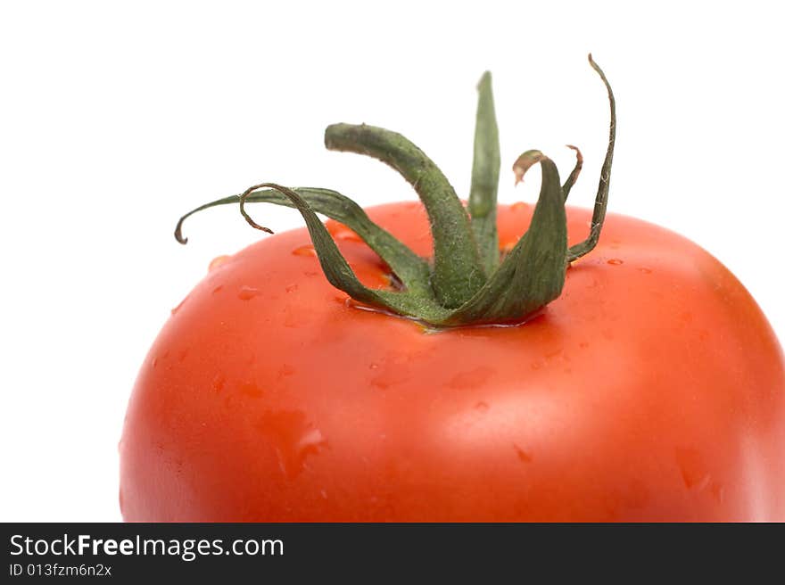 Red tomato on a white background