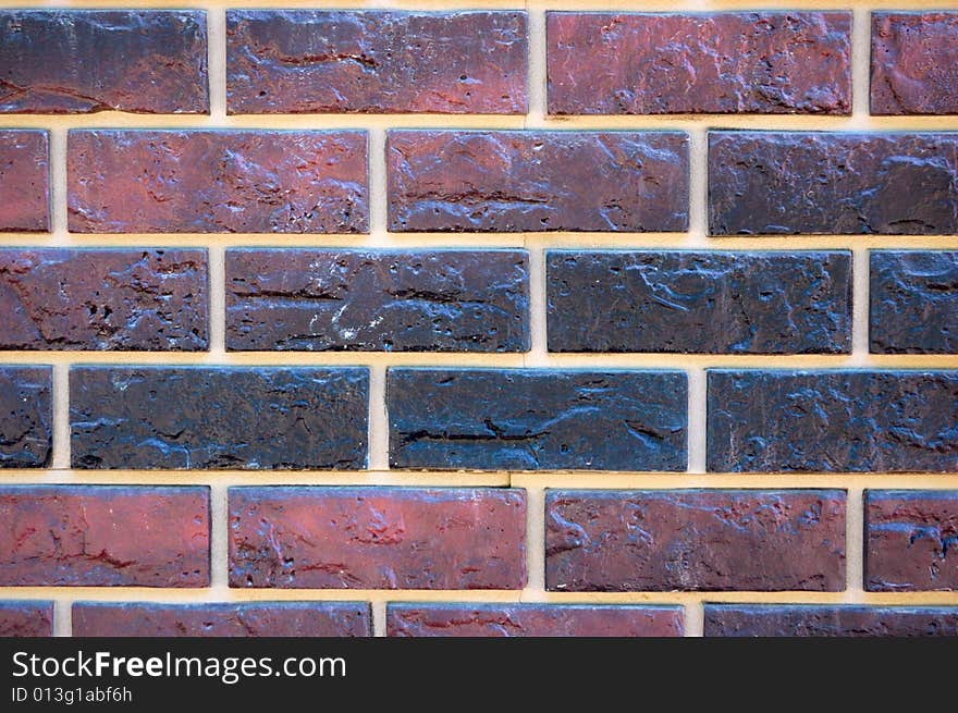 Old-style wall of decorative bricks