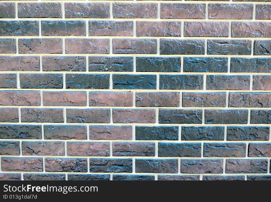 Old-style wall of decorative bricks