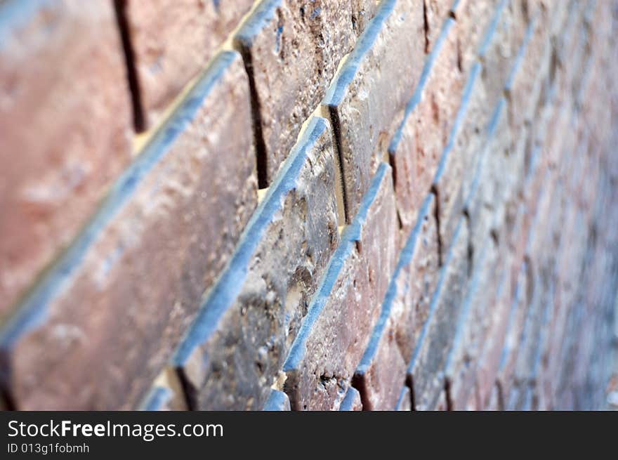 Old-style wall of decorative bricks