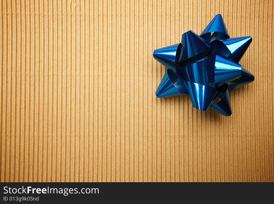 Corrugated Gift Box with a Blue Bow.