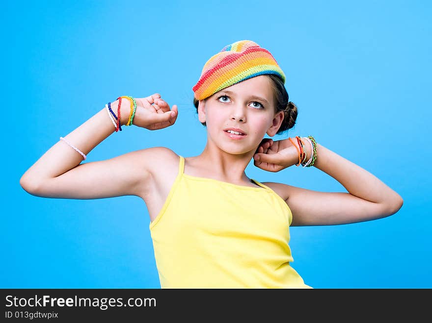 Beautiful young girl raising up her hands. Beautiful young girl raising up her hands