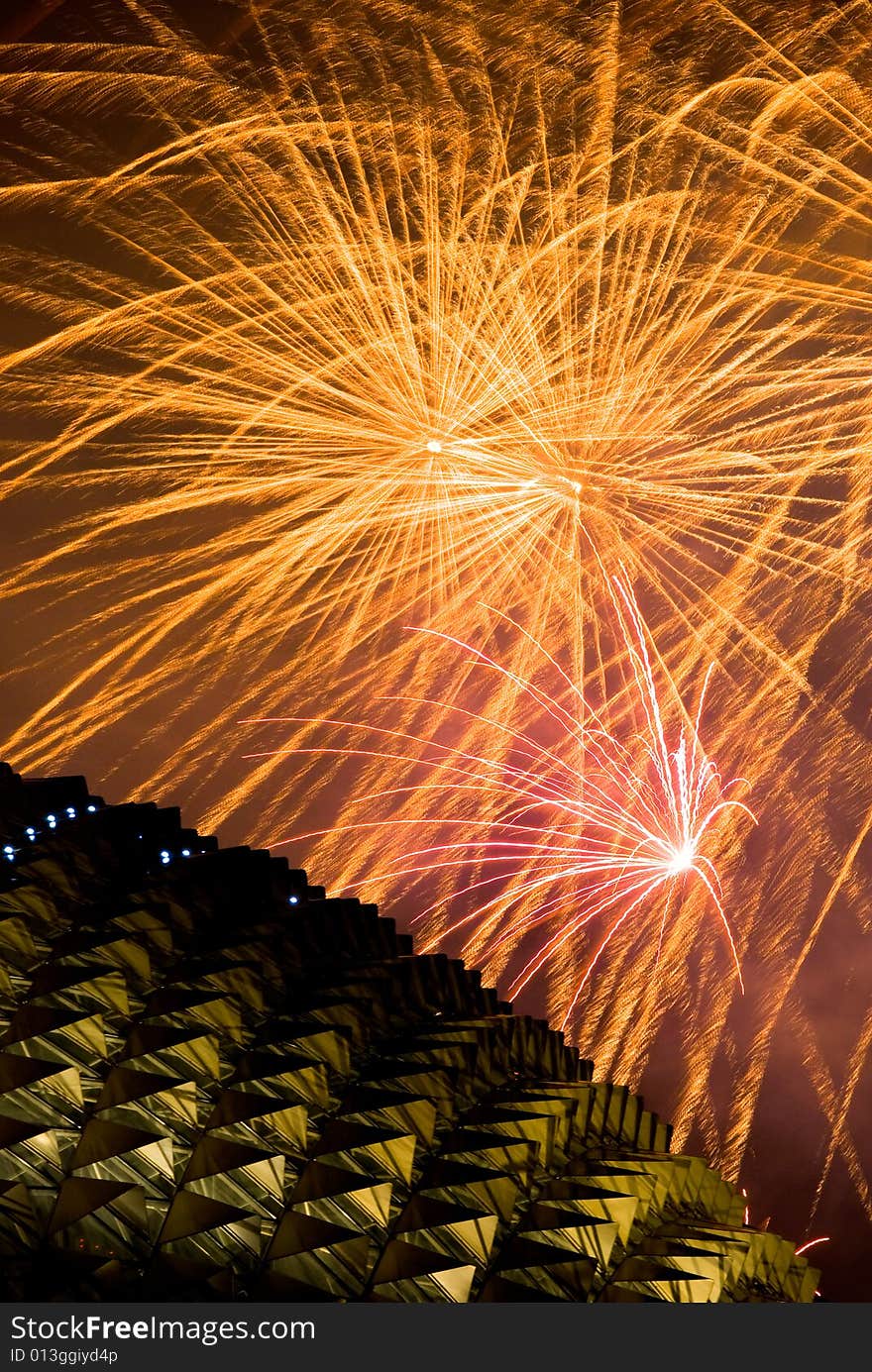 Fireworks display over the distinctive roof of the Singapore Esplanade Theater. Fireworks display over the distinctive roof of the Singapore Esplanade Theater