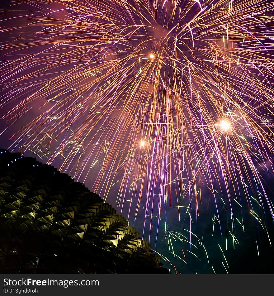 Fireworks display over the distinctive roof of the Singapore Esplanade Theater. Fireworks display over the distinctive roof of the Singapore Esplanade Theater