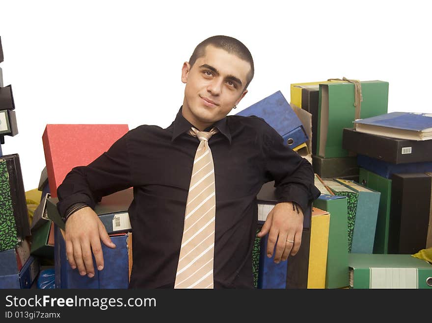 Young man with registers on work. Young man with registers on work