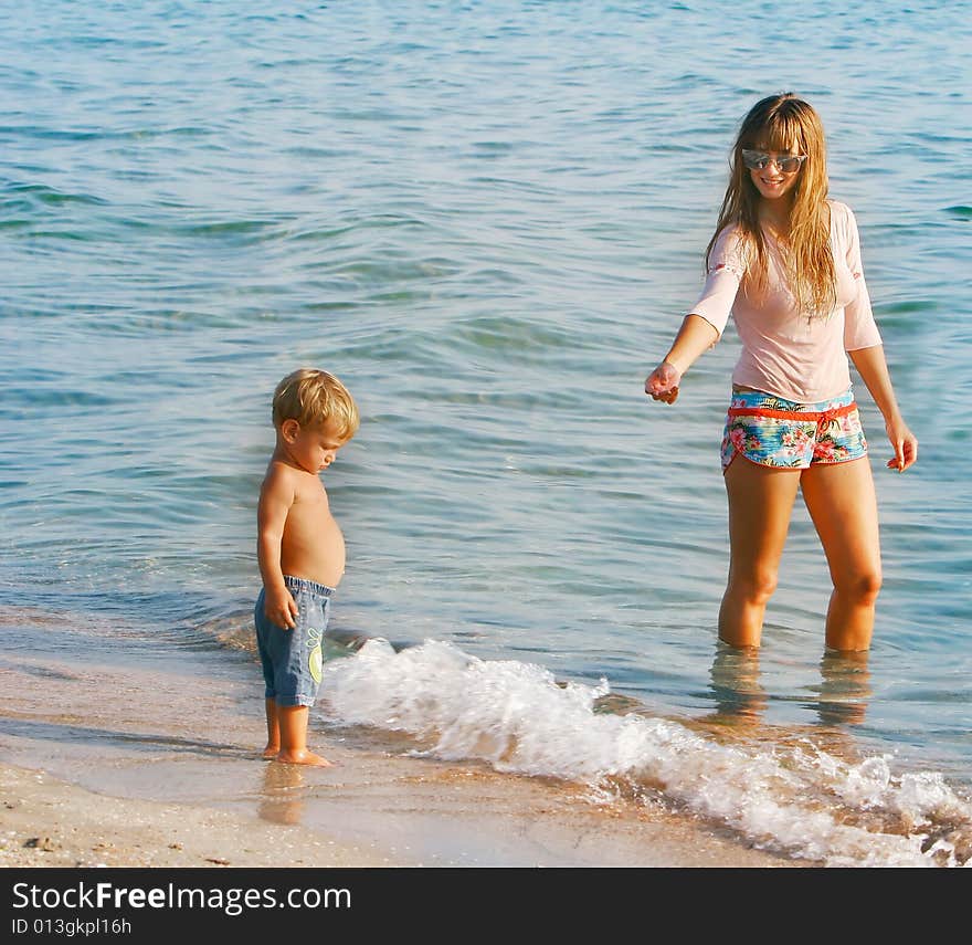 Mother and son on beach