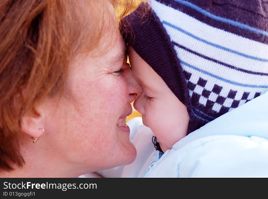 Family moments - mother and baby have a fun, soft focus