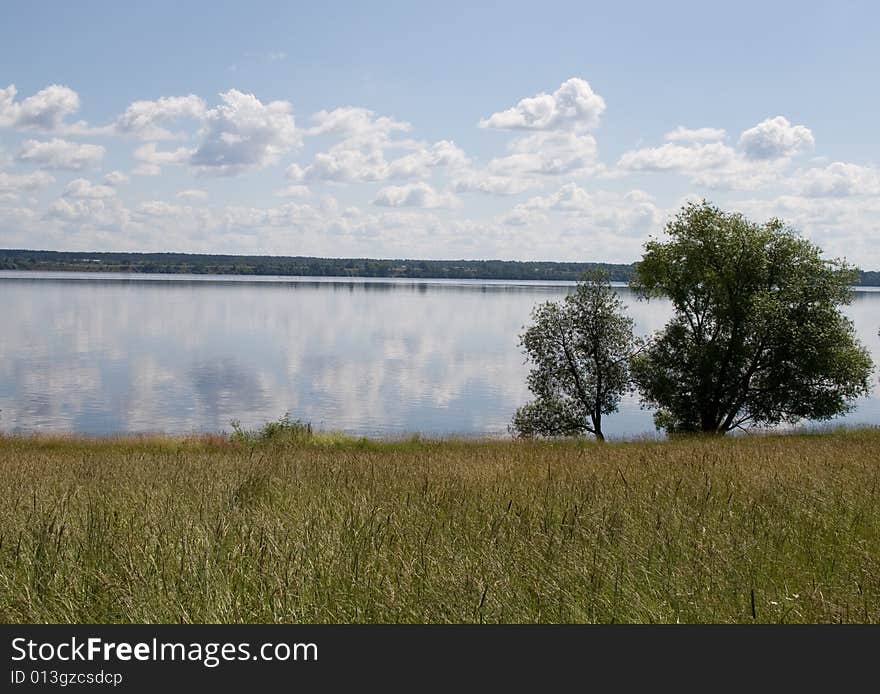 Summer landscape with a bank of river