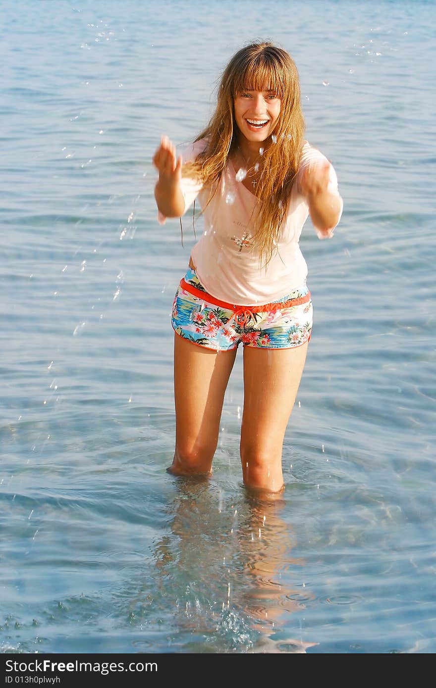 Happy Girl In Water Drops