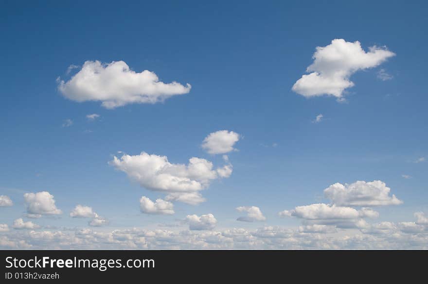 White clouds in a blue sky. White clouds in a blue sky