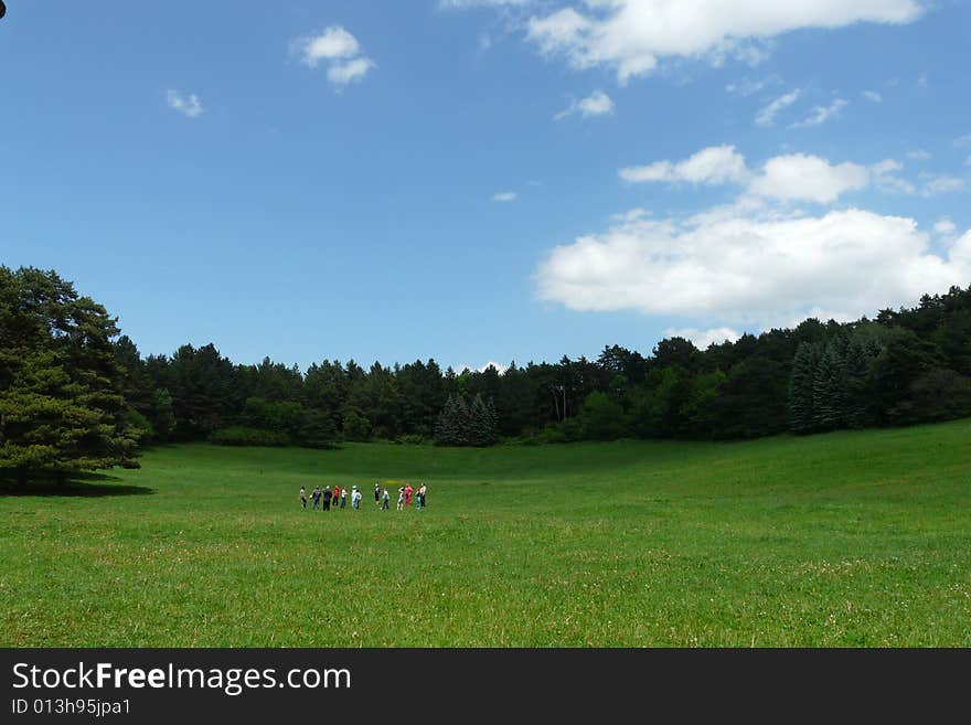 People playing on the meadow