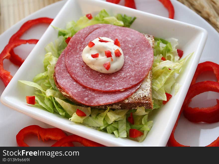 Breakfast with bread and meat on a bread