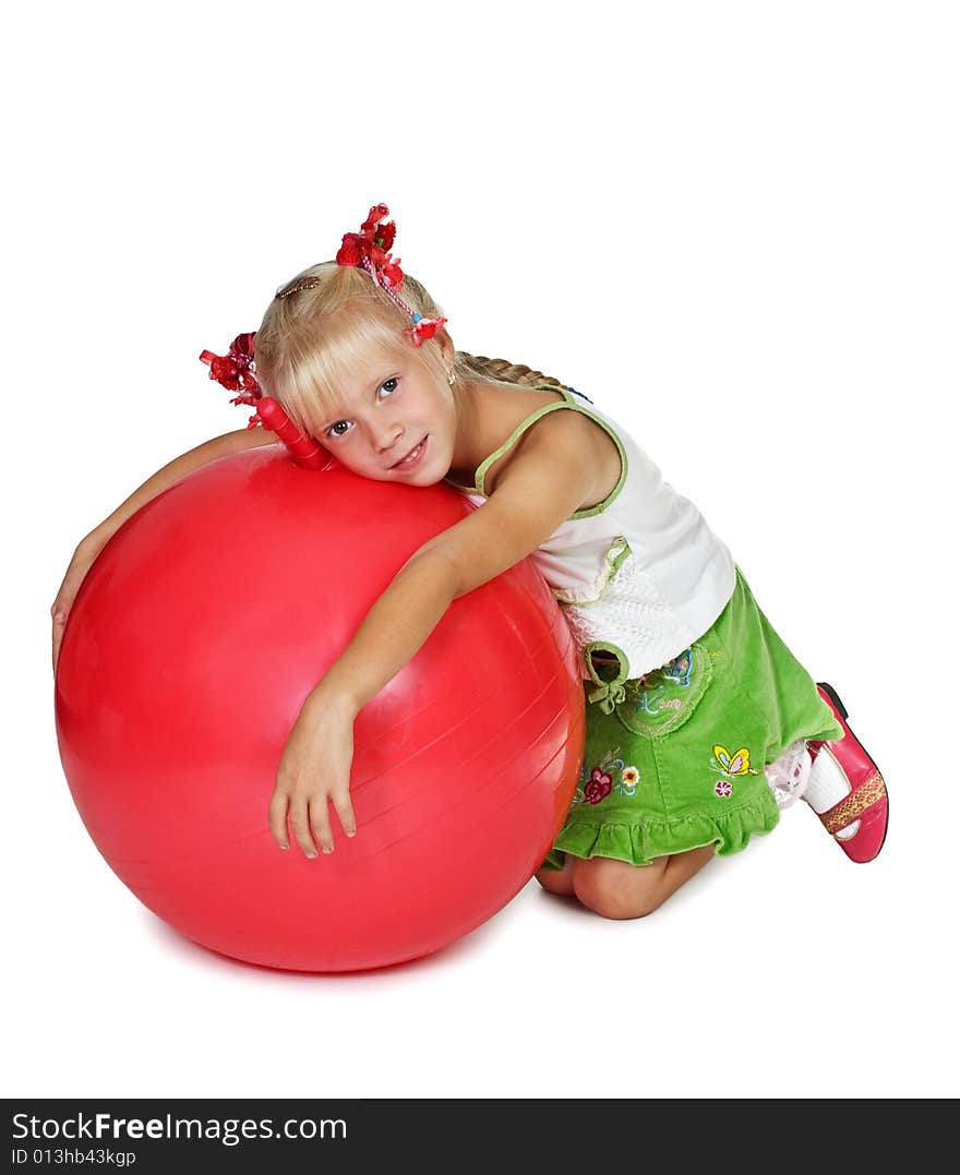 The girl with a greater red ball on a white background. The girl with a greater red ball on a white background