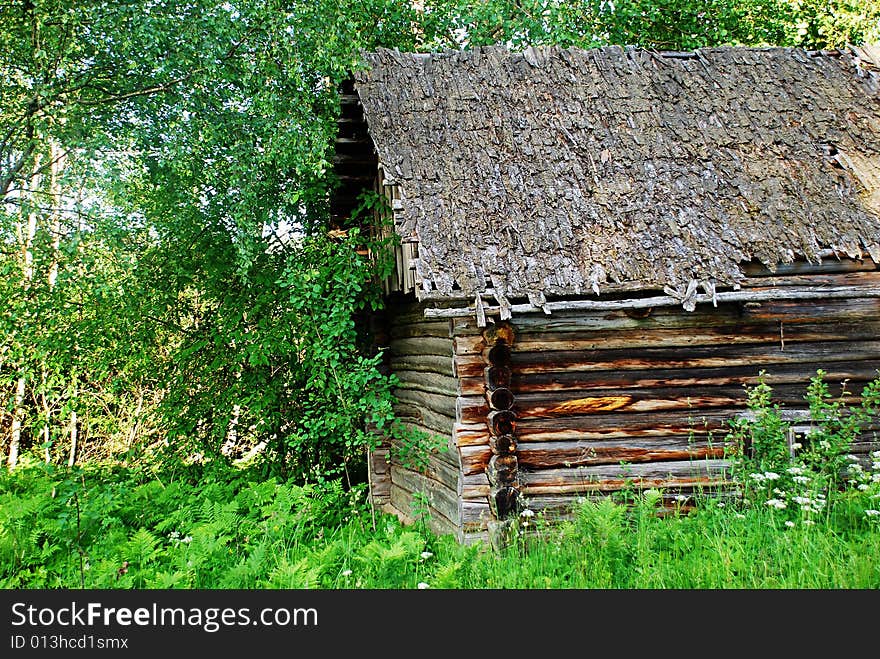 An old log bathhouse out in the country