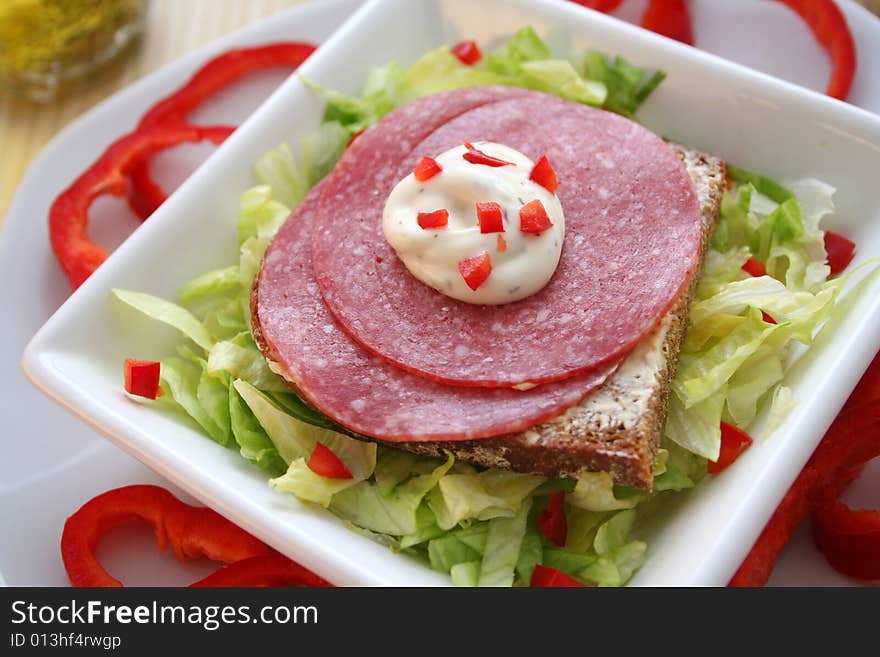 Breakfast with bread and meat on a bread