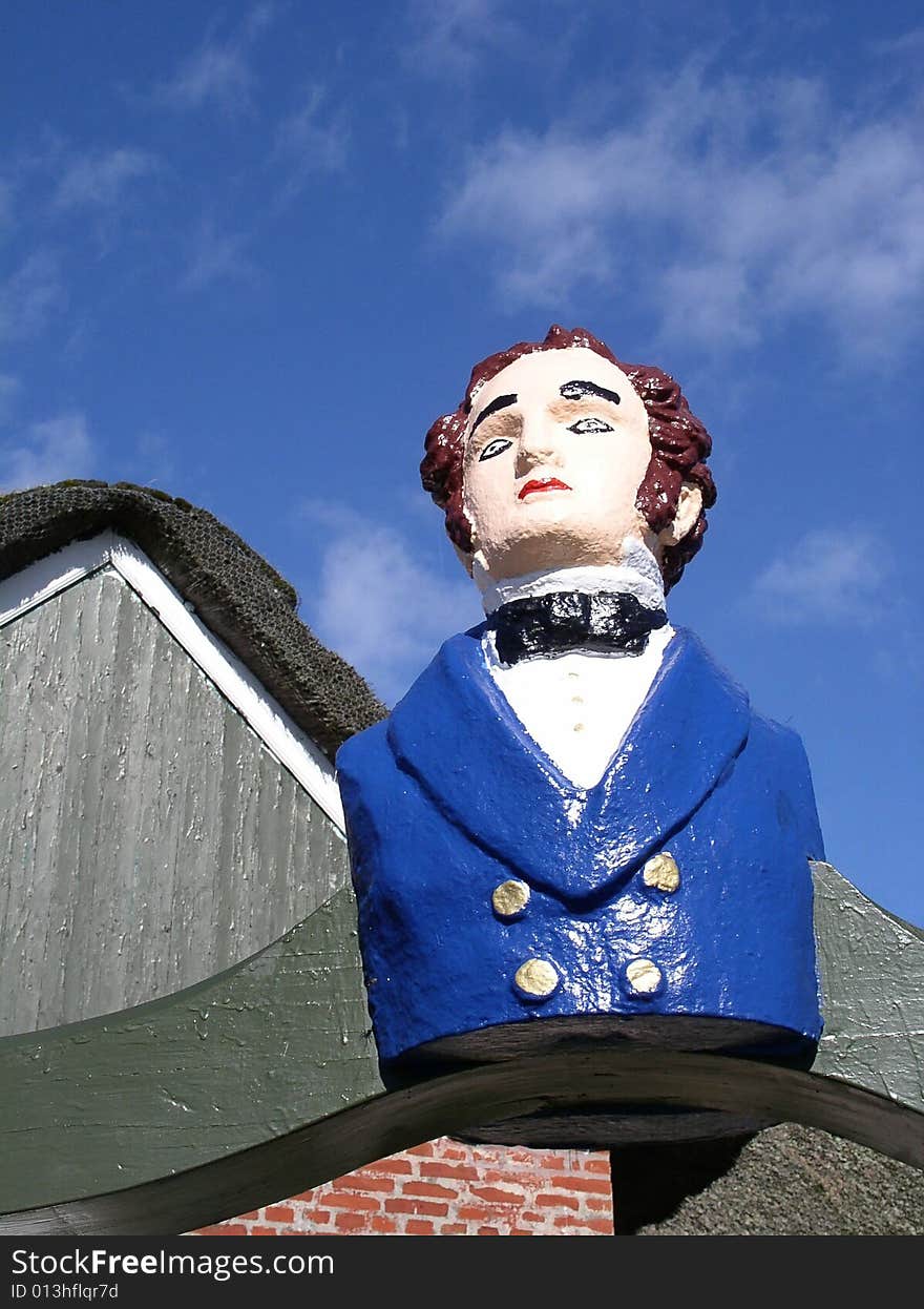 Male figurehead on cloudy sky. Shot in denmark.