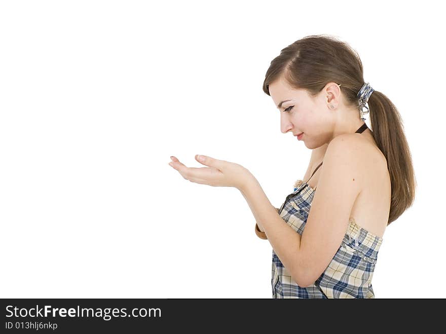 Beautiful young woman posing like holding something