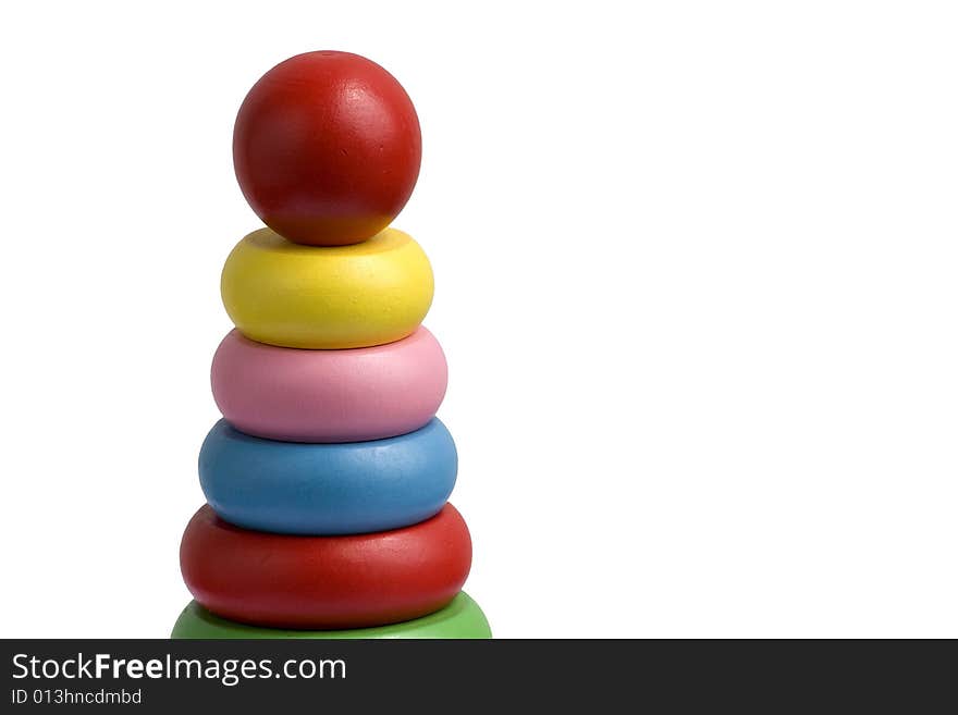 Closeup to wooden stacking rings on white background