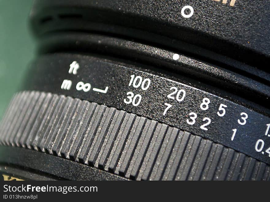 Macro shot of focal length settings on lens, selective focus