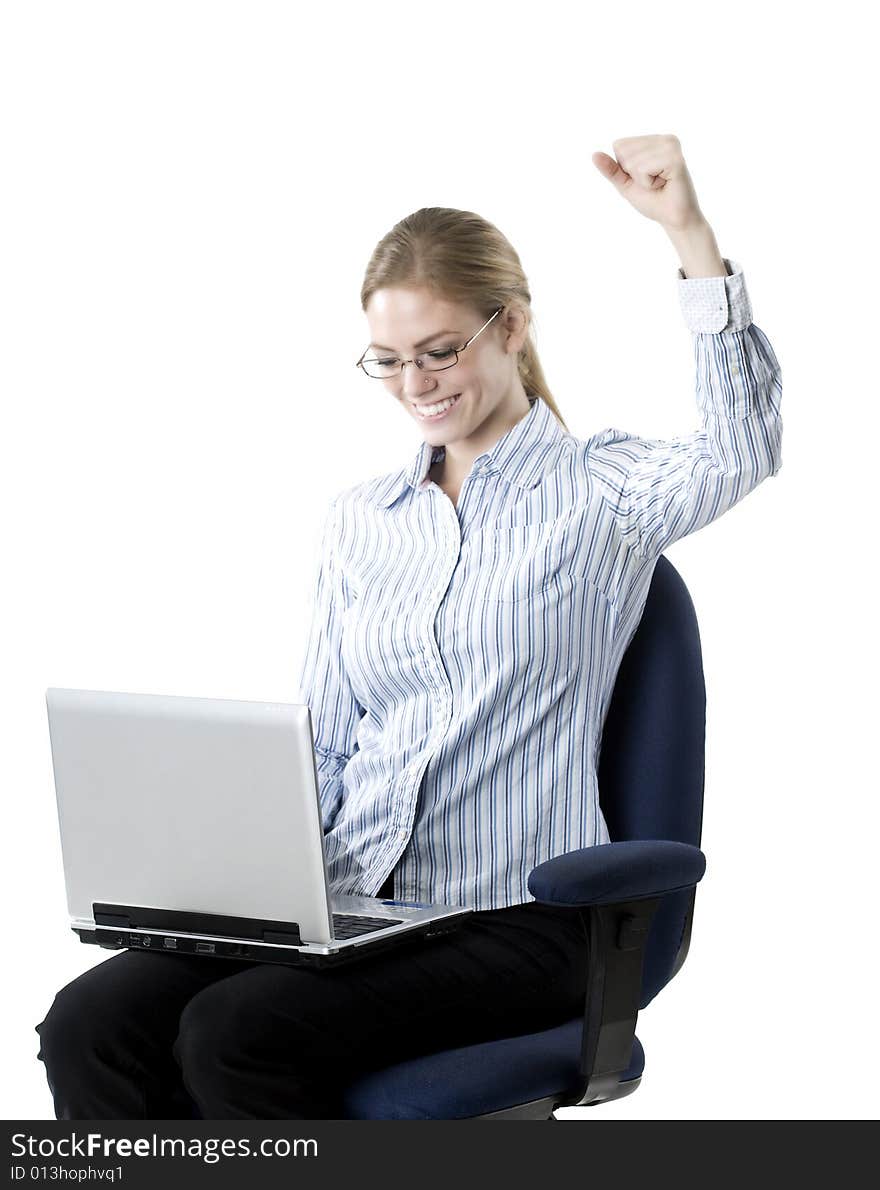 Portrait of a young attractive professional Caucasian female working on a laptop. Portrait of a young attractive professional Caucasian female working on a laptop.