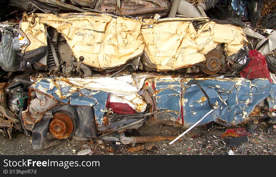 Pile of pressed cars in Tromsoe, norwegian arctic region. Pile of pressed cars in Tromsoe, norwegian arctic region