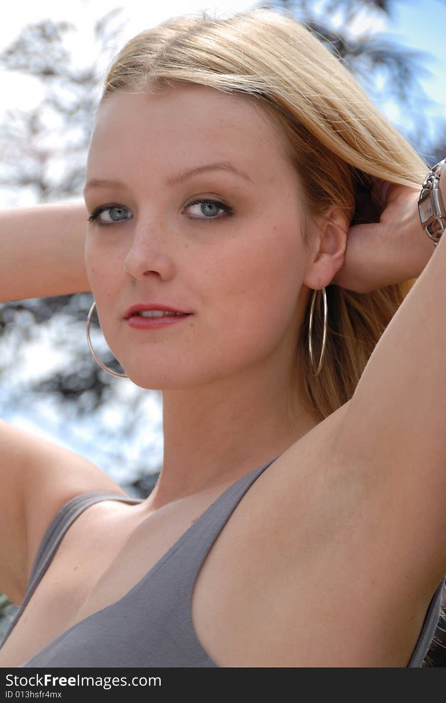 Close up portrait of cute young lady with straight blond hair. Close up portrait of cute young lady with straight blond hair