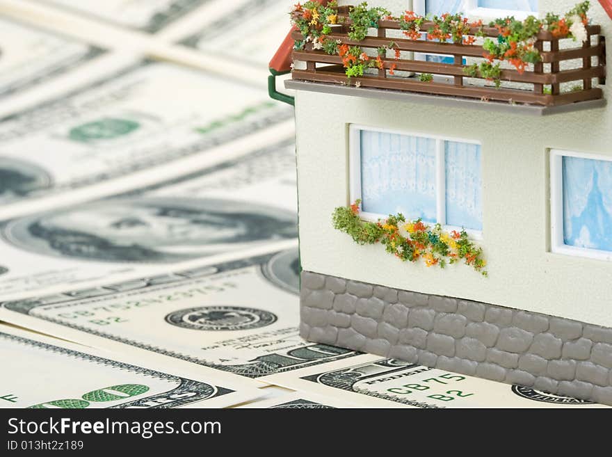 Miniature House and Money.
Buying house concept