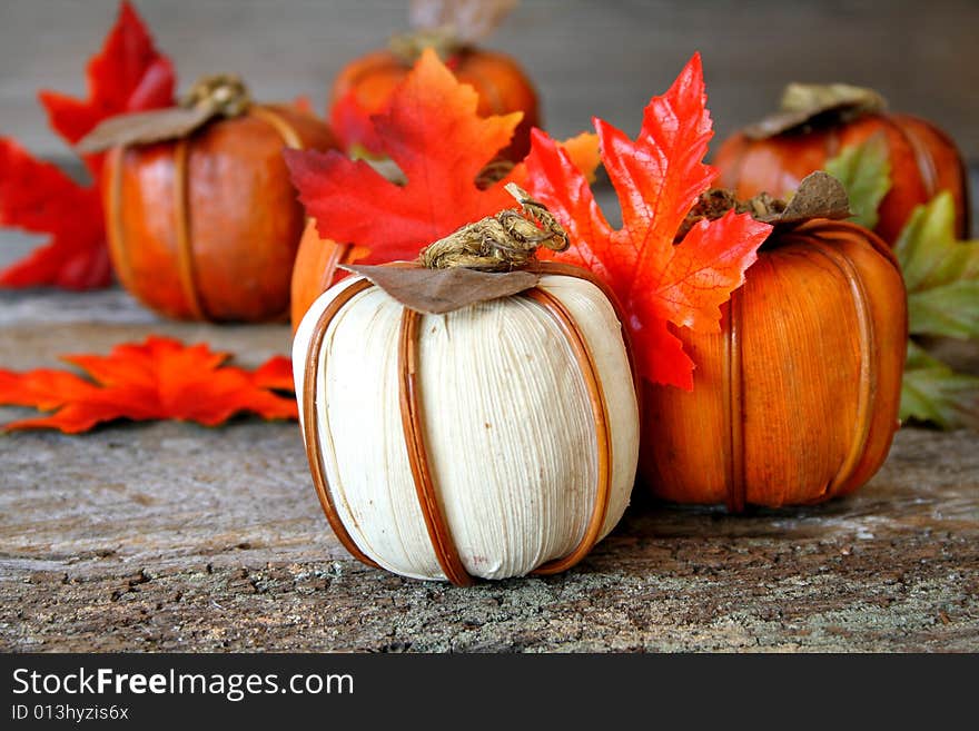 A pumpkin and fall leaf center piece for the holidays. A pumpkin and fall leaf center piece for the holidays.