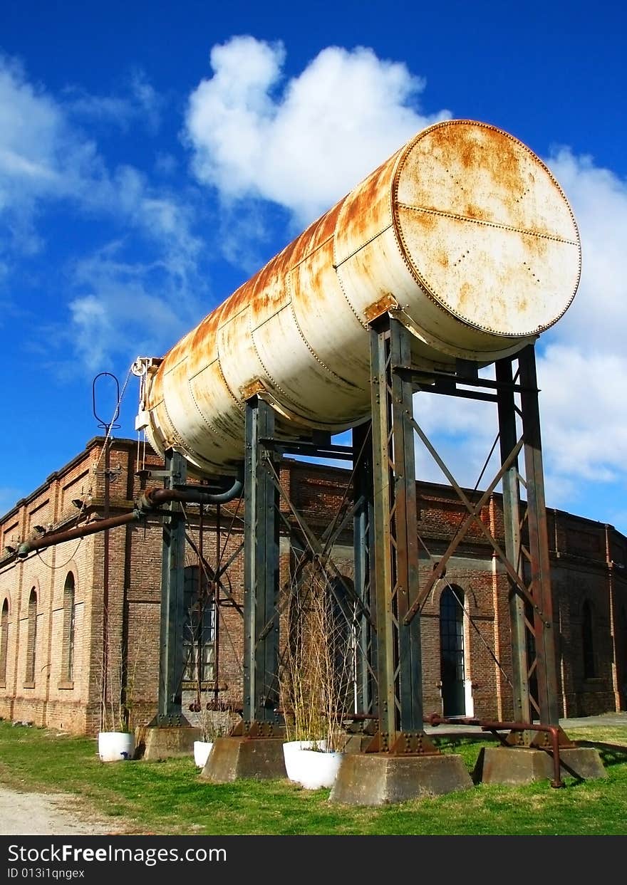 An old and rusty water tank. An old and rusty water tank.