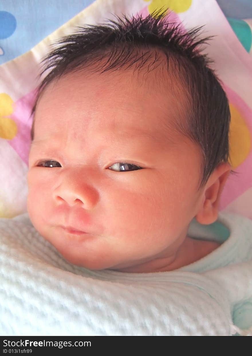 Cute baby on a bed