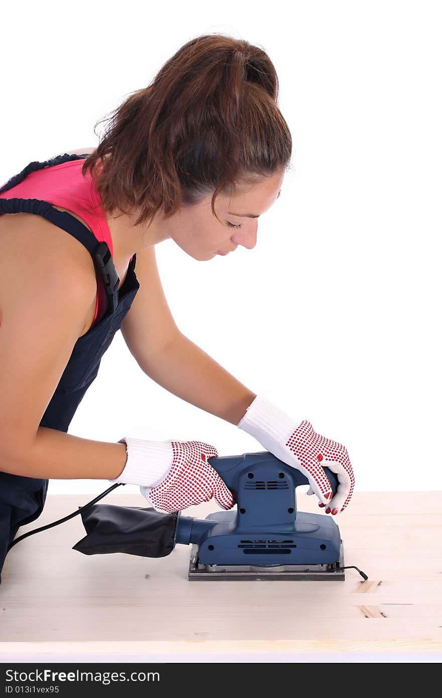 Woman carpenter at work on white background