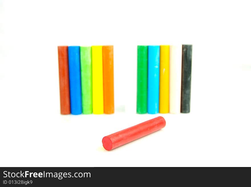 Oil pastels/crayons isolated against a white background