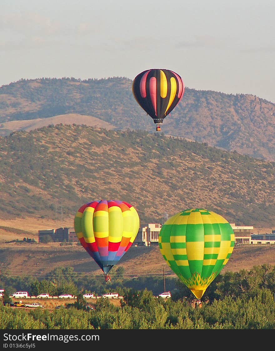 Three hot air balloons aloft. Three hot air balloons aloft