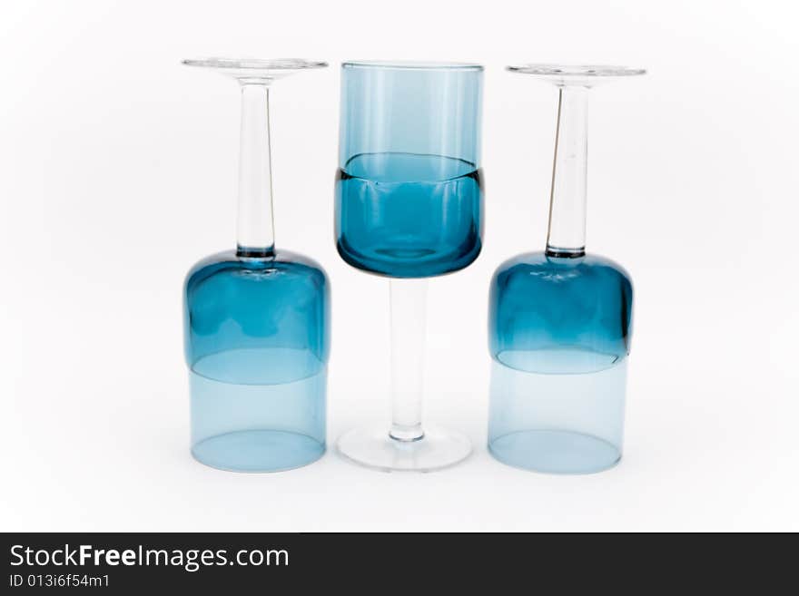 Turquoise glasses on a white background